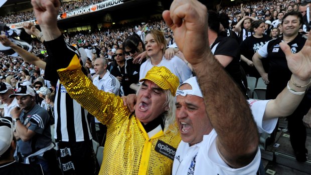 Joffa celebrates in the last quarter of the 2010 grand final replay with Collingwood fans.