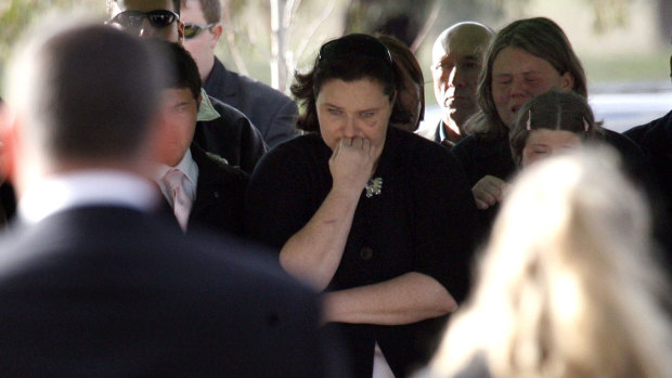 Shelly Walsh at the funeral of her mother and two children in 2009.