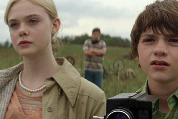 Elle Fanning and Joel Courtney in Super 8, in which she plays a girl cast as a zombie.