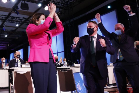 Annastacia Palaszczuk and Adrian Schrinner celebrate  in Tokyo as Brisbane is named 2032 Olympic host city.