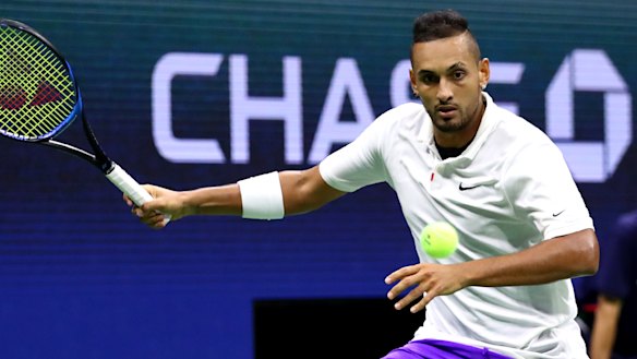 Taking a swing: Kyrgios in the backcourt against Rublev.