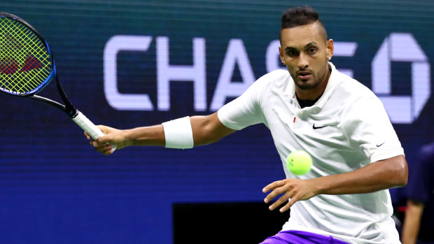 Taking a swing: Kyrgios in the backcourt against Rublev.