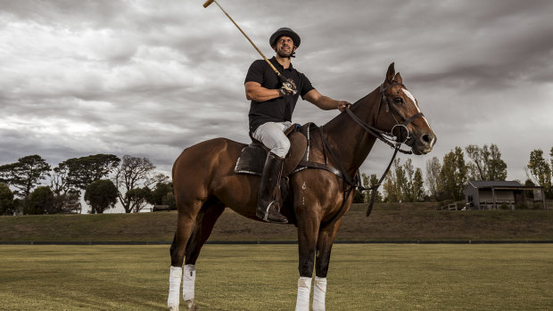 Tolga Kumova, pictured with mount Quago,  had never ridden a horse before buying Mingela polo farm  near Daylesford.