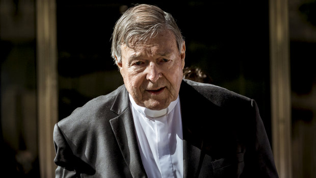 Cardinal George Pell leaves court after being found guilty in December of  sexually assaulting two choirboys in 1996.