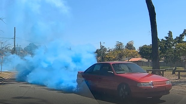 The baby gender reveal burnout done in a suburban street, south of Brisbane.