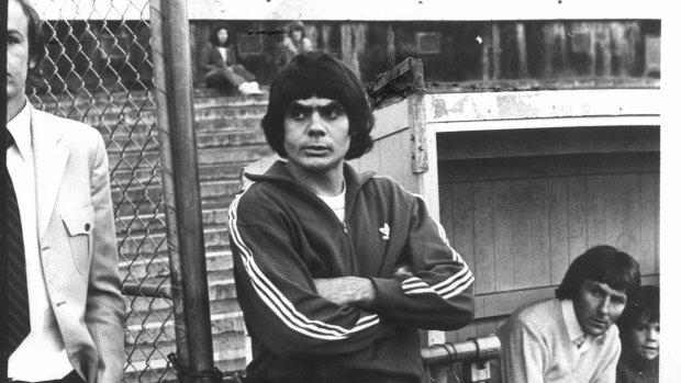 Robbie Muir watches St Kilda teammates at training in 1976.