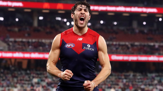 Christian Petracca roars his approval after booting a goal for the Demons.