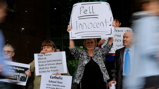 Peter Westmore with Pell Supporters outside a pre-trial hearing in March 2018. 