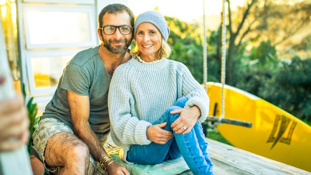 Cameron and Sam at their home on Sydney’s northern beaches, where she grew up almost 
living in the surf.