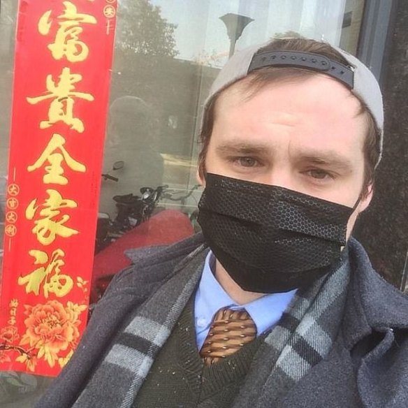 Connor Reed, 25, in Wuhan, China. Having recovered from one of the earliest suspected cases of the coronavirus COVID-19, he is hoping to return to Brisbane, Australia.