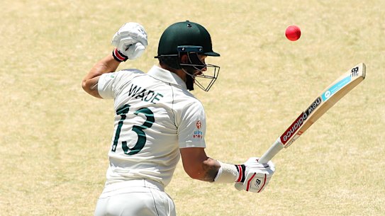 Matthew Wade was hit on the glove by Neil Wagner.