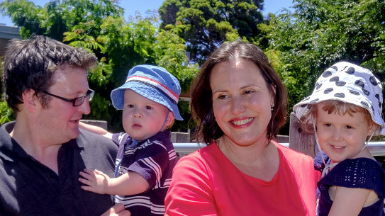 Federal cabinet minister Kelly O'Dwyer with her husband John Mant and children after announcing her resignation from politics.