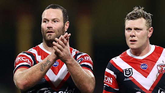 Boyd Cordner (left) was cheered by the Roosters faithful when he returned to the field on Friday night.