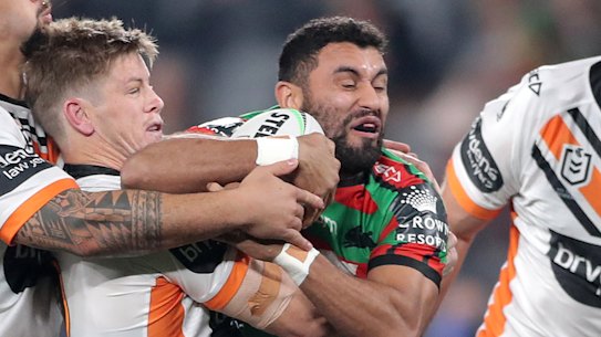 Alex Johnston is tackled.