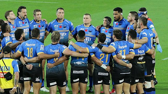 Better together: Force players form a huddle after their win over the Reds on Friday night.