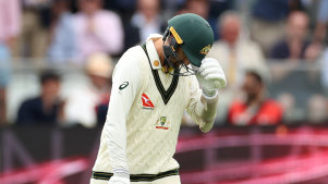 Nathan Lyon hobbled out to bat at Lord’s despite a calf injury that would rule him out for the rest of the Ashes series.
