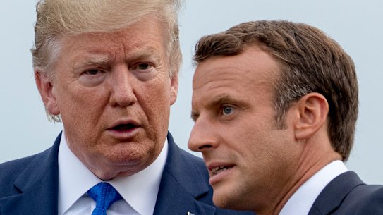 French President Emmanuel Macron, right, said the US under President Donald Trump appeared to be "turning its back on us".