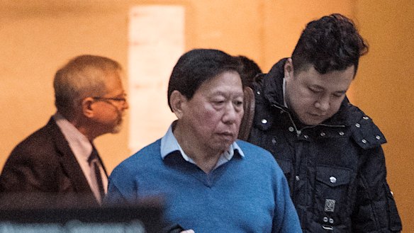 Liu Xiaozong, right, husband of Meng Wanzhou, Huawei's chief financial officer arrives at the courthouse for a bail hearing for his wife.
