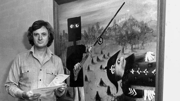 The National Gallery of Australia's founding director, James Mollison, in 1975 with Sidney Nolan's Death of Sergeant Kennedy at Stringybark Creek, one of Nolan's Ned Kelly paintings. 