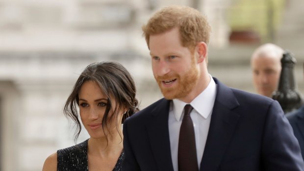 Upset by the loss: Meghan Markle and Prince Harry.