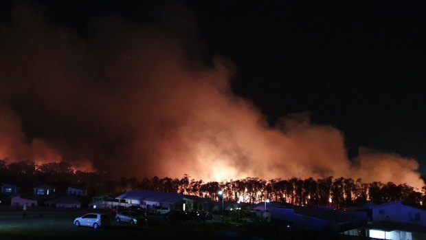 A fire rages at Peregian Beach on Sunshine Coast.