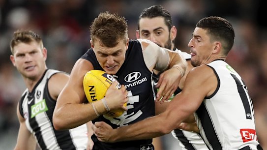 Cripps is tackled against Collingwood