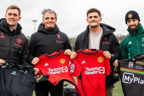 Manchester United technical director Darren Fletcher (far left) and captain Bruno Fernandes (far left) Ivan and Nathan Cleary.