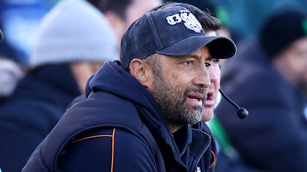 Marshall watches on from the sidelines