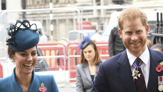 Britain's Prince Harry, the Duke of Sussex, right and Kate, the Duchess of Cambridge arrive for the Anzac Day Service of Commemoration and Thanksgiving at Westminster Abbey.