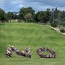 Protesters gather at Victoria Park in Brisbane. 