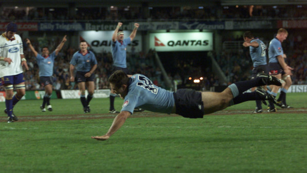 'Halcyon days': Scott Staniforth scores for the Waratahs in the side's record-breaking 2002 season. 