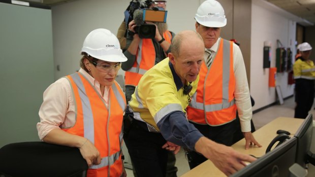 Energy Minister Dr Anthony Lynham and Treasurer Jackie Trad inside CleanCo's hydroelectricity plant at Wivenhoe Dam.