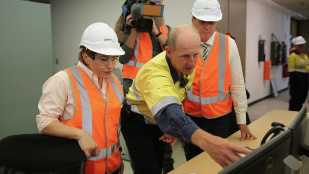 Energy Minister Dr Anthony Lynham and Treasurer Jackie Trad inside CleanCo's hydroelectricity plant at Wivenhoe Dam on Thursday.