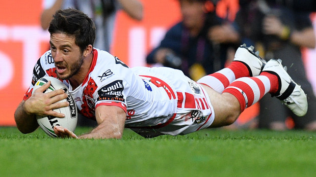 Breathing fire: Ben Hunt crosses for a brilliant try just before half-time on Anzac Day.