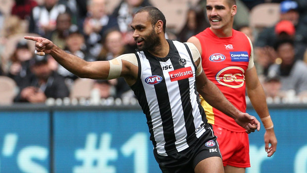 Collingwood's Travis Varcoe celebrates a goal against Gold Coast on Sunday at the MCG.