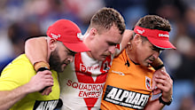 Jacob Liddle is assisted off the field injured