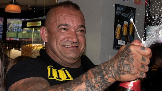 Image ID:
917c26a020fa0f3a3a874c78dfae8a3ae4b283cf
Description *
Richmond player Dustin Martin's father Shane 'Kiwi" Martin reacts after the Richmond Tigers win the AFL grand final, Auckland, New Zealand, September 29,  2019.  Richmond have beaten GWS by 89 points in the AFL grand final at the MCG. Dustin Martin also won the Norm Smith Medal for the second time. (AAP Image/Brett Phibbs) NO ARCHIVING
EditSource *
