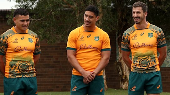 Wallabies (from right) Michael Hooper, Angus Bell, Jake Gordon, Lalakai Foketi, Izaia Perese and Lachie Swinton at a jersey launch at St Johns Primary School, Auburn.