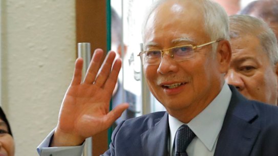 Facing trial: Najib Razak.