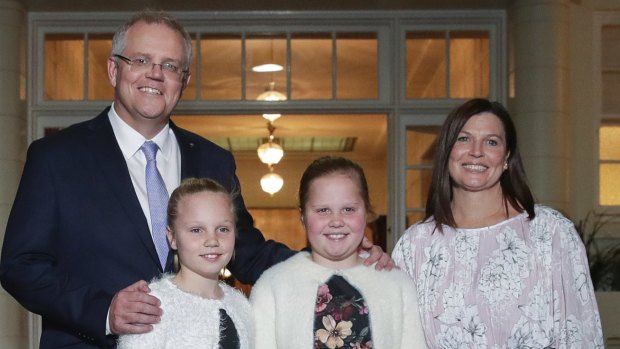Prime Minister Scott Morrison, with his wife Jenny and daughters Abigail and Lily, after being sworn-in at Government House.