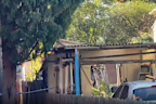 Neighbours say they called fire crews after hearing crackling across the street.