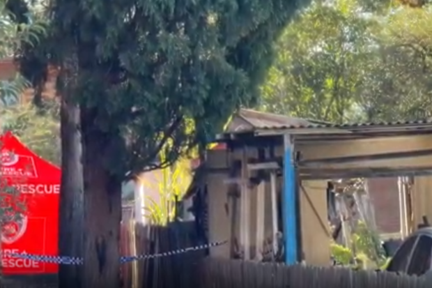 Neighbours say they called fire crews after hearing crackling across the street.