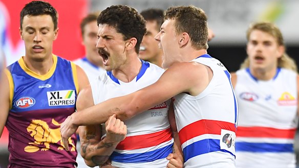 Tom Liberatore, Jack Macrae, Bailey Smith and their Western Bulldogs teammates booked their date with destiny against the Power with a thrilling win over the Brisbane Lions.