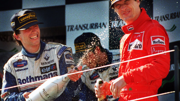 Happier times: Damon Hill (left) winning the 1996 Australian Grand Prix for Williams.