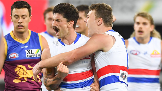 Tom Liberatore, Jack Macrae, Bailey Smith and their Western Bulldogs teammates booked their date with destiny against the Power with a thrilling win over the Brisbane Lions.