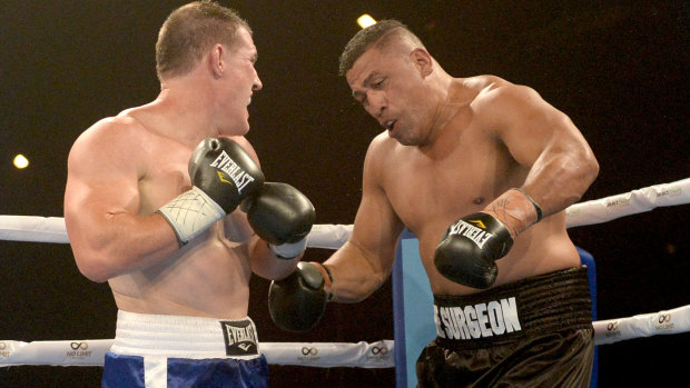 Paul Gallen (left) and John Hopoate in action during the Star of the Ring charity fight night at Hordern Pavilion.
