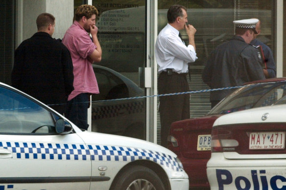 Bystanders at the scene of a fatal shooting at The Fertility Control Clinic in Wellington Parade, East Melbourne.