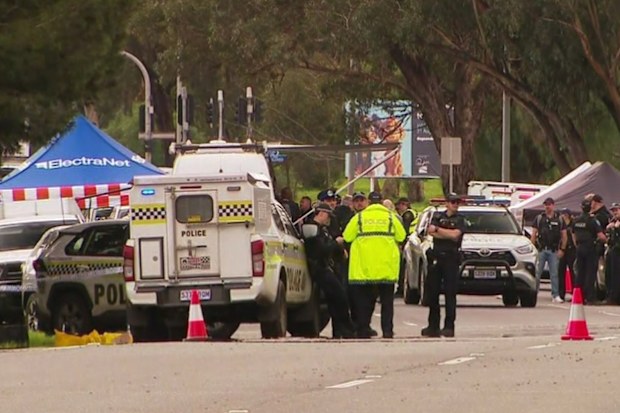 Emergency services at a scene in Adelaide after a police officer was stabbed.
