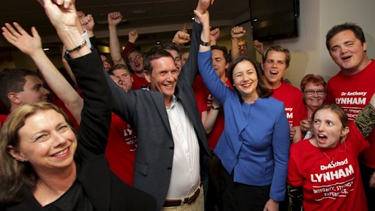 Victorious Labor candidate Anthony Lynham celebrates victory in the Stafford by-election with enthusiastic Opposition Leader Annastacia Palaszczuk.