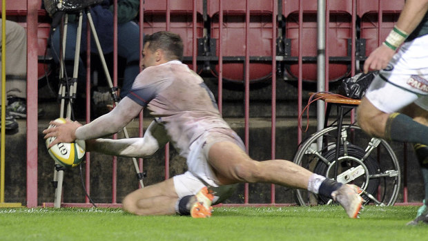 Losing streak over: Jonny May kills off the contest with a late try.